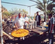 ayo cooking in paella restaurant